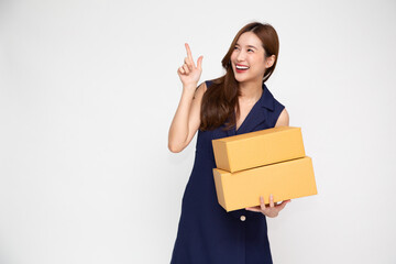 Happy Asian woman smiling and holding package parcel box isolated on white background, Delivery courier and shipping service concept