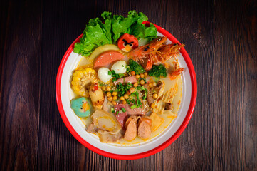 Mala Hot Pot Clear water with spices and herbs, hot and spicy.
