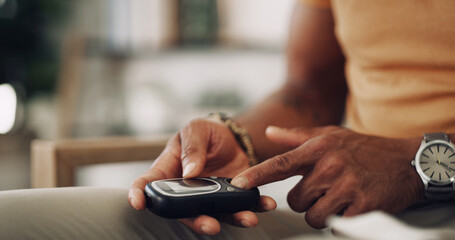Home, hands and man with diabetes machine, testing for glucose levels and healthcare. Closeup,...