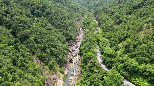 Top view of the river in the canyon in the center of Hainan Island, China. The wildlife of the island. A national park in China.