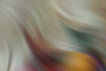 Senior couple joyfully exercising with arms raised while sitting on exercise balls in a gym setting
