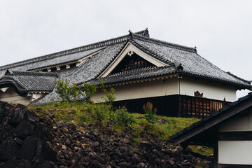 Kumamoto Castle, exterior view, Kumamoto city, Chuo-ku, Kyushu island region, Japan, spring landscape view and blooming sakura cherry blossom, Kumamoto prefecture, travel to Japan, Japanese castle