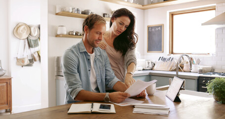 Home, conversation and couple with documents, finance and payment for mortgage, rent and love. Tax return, budget and man with woman in kitchen, invest or paperwork with report for savings or talking