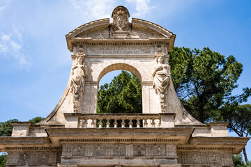 Entrance portal to the Farnese Gardens (Horti Palatini Farnesiorum) on the Palatine Hill, designed by Vignola for Cardinal Alessandro Farnese in the 16th century, in Rome, Italy
