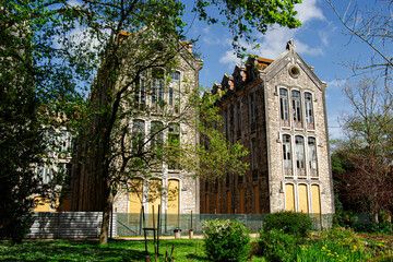 Historic building Parque Dom Carlos I surrounded by greenery in Caldas da Rainha, Portugal, on a sunny day