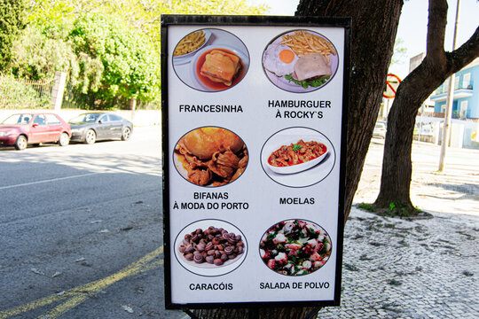 Portuguese restaurant menu sign with traditional dishes in Caldas da Rainha, Portugal