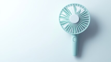 Pastel teal portable fan