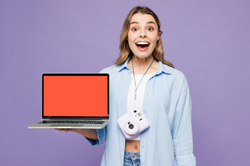 Traveler IT woman in blue clothes hold use work on blank screen laptop pc computer isolated on...
