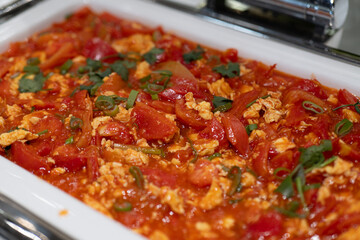 Delicious Stir-Fried Tomatoes and Eggs with Fresh Cilantro Garnish