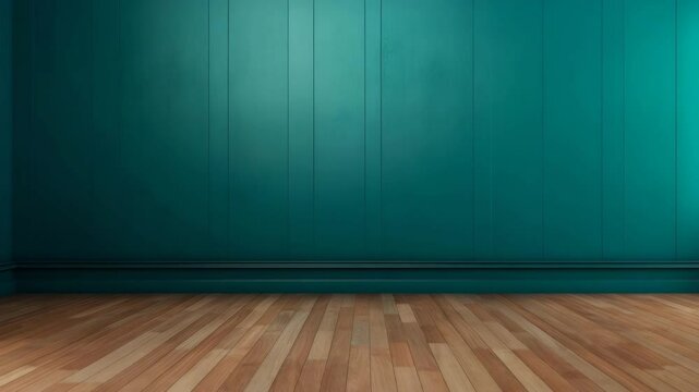 An empty room with teal walls and a wood floor.