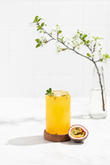 refreshing summer drink, pineapple juice with passion fruit