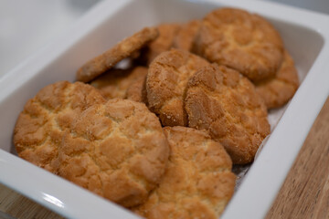 Delicious Biscuits in White Container, Crispy and Sweet Aroma