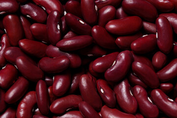 Red dry haricot beans, for backgrounds or textures. Top view. The ingredient.