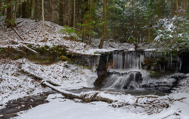 Frozen waterfall in the forest