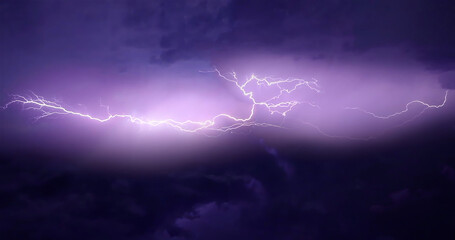 Lightning storm in the night sky. Lightnings and thunders illuminate night sky