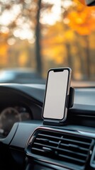 Blank screen mobile phone in man's hand while driving (Mockup for navigation app). Smartphone in Car Mount with Autumn Background