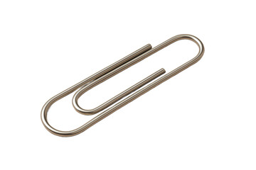 A single metallic paperclip lies flat on a light background, shining slightly.