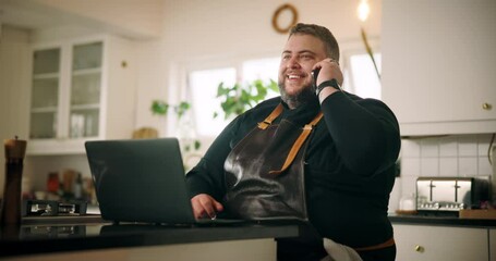 Man, chef and talk with phone call at house for communication, menu planning and catering service. Male person, laptop and mobile for discussion, recipe research and meal preparation for event order