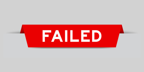 Red color inserted label with word failed on gray background