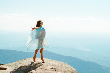 beautiful girl in a swimsuit in the mountains