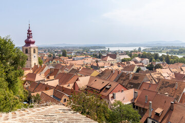 Scenic view from medieval castle of Ptuj with main city tower and river Drava in Styria region in Slovenia