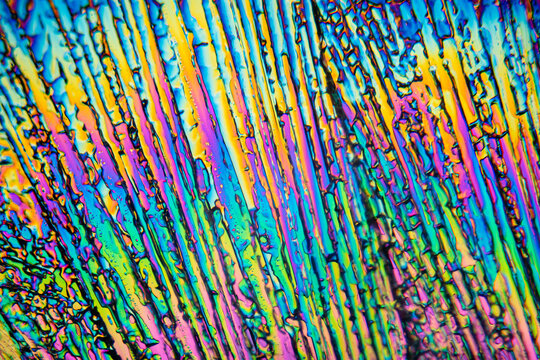 Vibrant erythritol crystals showcasing intricate patterns in a colorful abstract design - Powered by Adobe