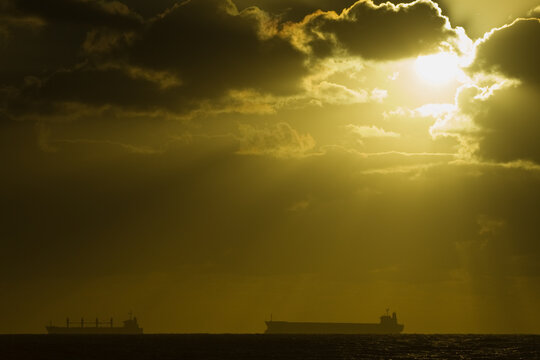 Container ships at dusk in Gage Roads, Fremantle.
