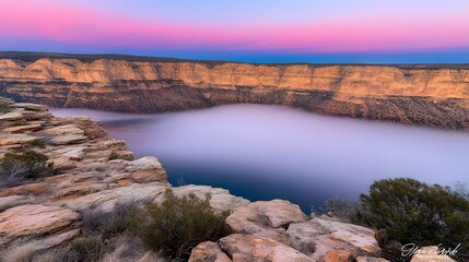 Majestic Canyon at Sunrise Fog Draped Valley with Breathtaking Pink Sky