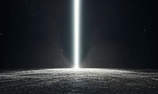A beam of light shines on the ground, with a black background and particles floating in front of it. The beam is extremely thin, with white particle effects around its edges.