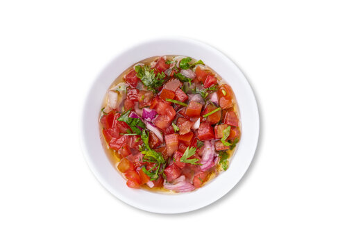 Vinagrete, typical brazilian sauce with tomato, onion, vinegar, olive oil and parsley isolated over white background