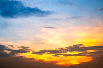 Beautiful , luxury soft gradient orange gold clouds and sunlight on the blue sky perfect for the background, take in evening,Twilight, Large size, high definition landscape photo