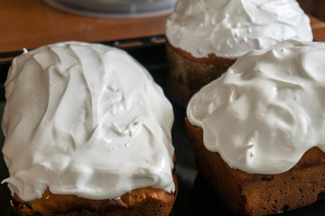 making a cake in a mixer. Cake with white topping. Dessert