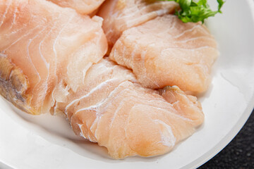 Fish fillet raw white fish seafood appetizer dish organic fresh tasty gourmet food background on the table rustic food top view copy space