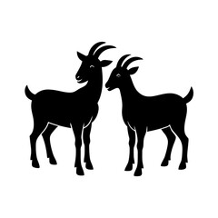 Fototapeta premium Silhouette of two goats standing together