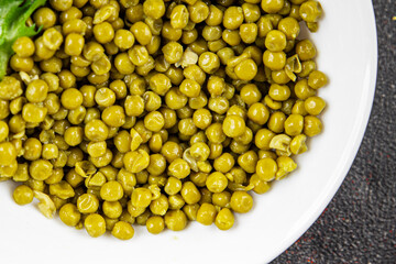 Green peas canned appetizer vegetables dish organic product fresh tasty gourmet food background on the table rustic food top view copy space keto and paleo diet vegetarian and vegan food
