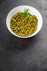 Green peas canned appetizer vegetables dish organic product fresh tasty gourmet food background on the table rustic food top view copy space keto and paleo diet vegetarian and vegan food
