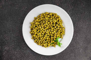 Green peas canned appetizer vegetables dish organic product fresh tasty gourmet food background on the table rustic food top view copy space keto and paleo diet vegetarian and vegan food