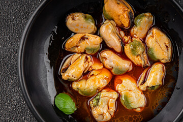Mussels seafood canned appetizer dish organic fresh tasty gourmet food background on the table rustic food top view copy space