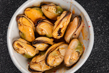 Mussels seafood canned appetizer dish organic fresh tasty gourmet food background on the table rustic food top view copy space