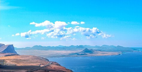 Panoramic views over the impressive volcanic landscape and the Atlantic on the island of Lanzarote