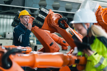 Technician Engineer in Factory, Maintaining and Repairing Robotic Arms Machinery, Ensuring Smooth...