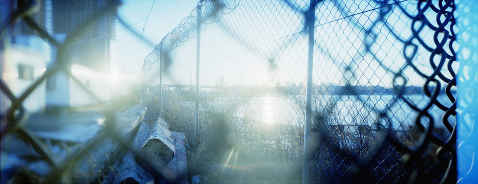 Panoramic view of construction site viewed through a fence, Williamsburg, Brooklyn, New York City, New York State, USA.