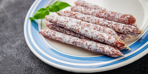 Sausage dried salami aperitif meat natural food dish organic product fresh tasty gourmet food background on the table rustic food top view copy space