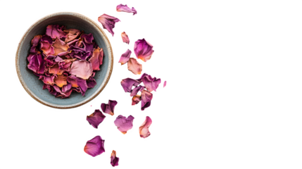 Aesthetic flatlay with spilled dried petals and ceramic bowl