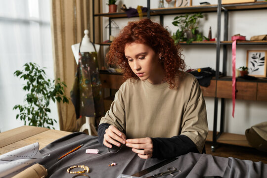 Creative craftswoman designs unique jewelry in her stylish DIY workspace during a sunny afternoon