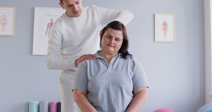 Neck exercise massage, manual therapy rehabilitation for obese woman, physical therapist, doctor nurse doing manipulative therapy, medical session to relieve pain, tension, reduce ache, relaxation 