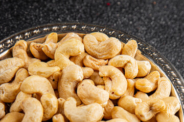 Cashew nuts superfood natural food dish organic fresh tasty gourmet food background on the table rustic food top view copy space