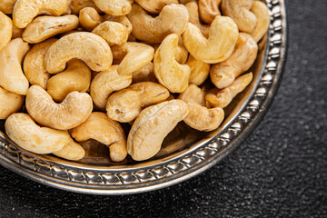 Cashew nuts superfood natural food dish organic fresh tasty gourmet food background on the table rustic food top view copy space