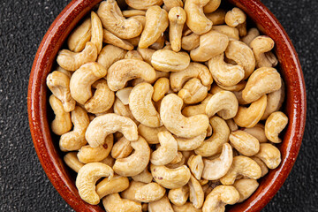 Cashew nuts superfood natural food dish organic fresh tasty gourmet food background on the table rustic food top view copy space