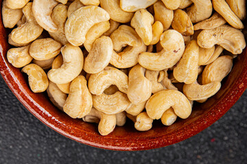 Cashew nuts superfood natural food dish organic fresh tasty gourmet food background on the table rustic food top view copy space